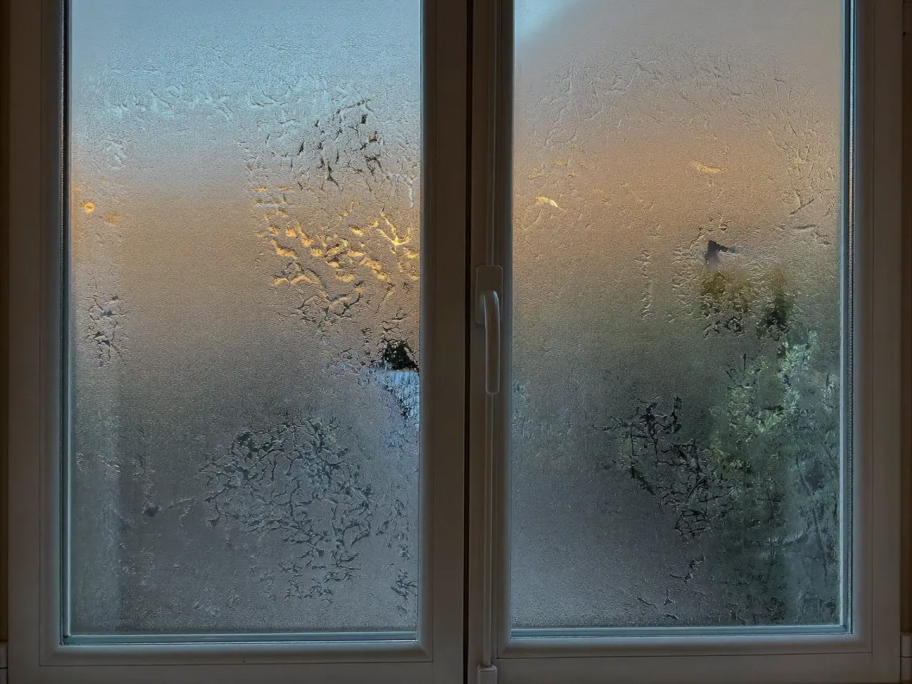 Clear condensation-free window on a cold winter morning