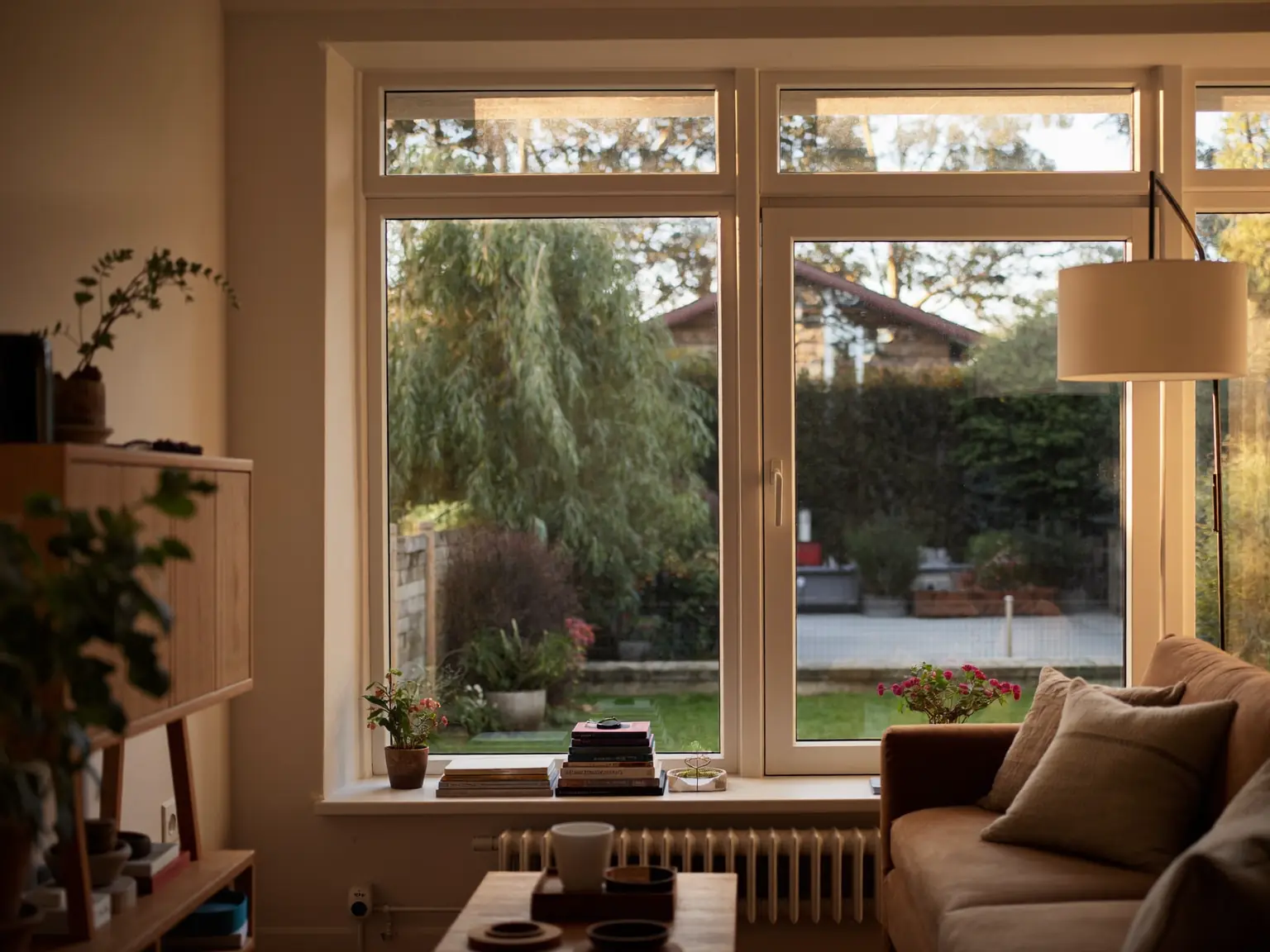 Warm sunlit living room fitted with new energy-efficient double glazing